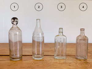 Four Vintage Clear Glass Bottles – Small Town Antiques